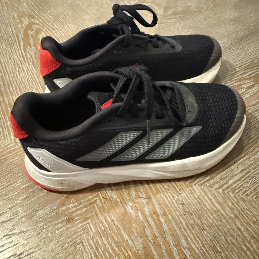 Black and Red Athletic Shoes
